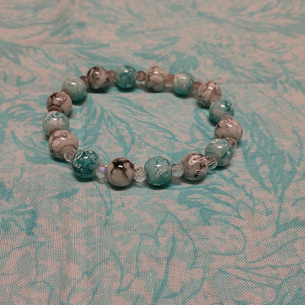 teal and white marble bracelet🐳